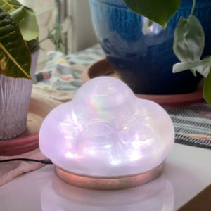 weather sensing cloud lamp made from 3d printed recycled plastic placed on a tabletop